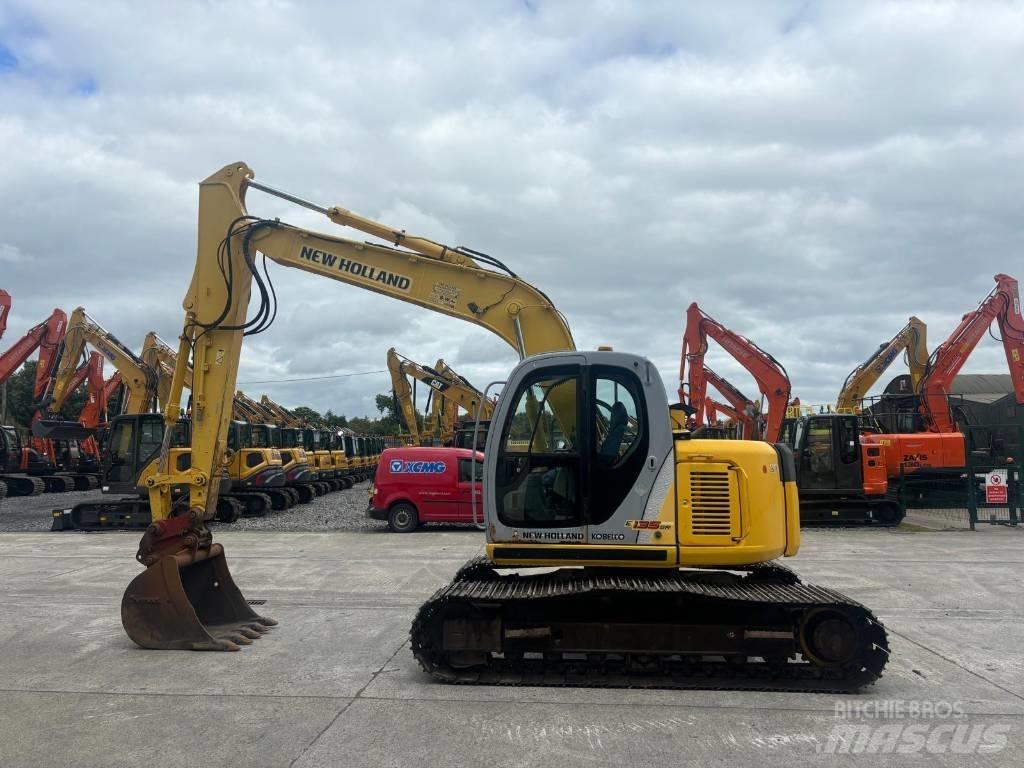 New Holland E 135 SR Pásová rýpadla