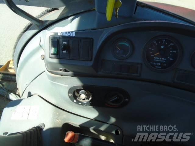 New Holland 575 E Rýpadlo-nakladače
