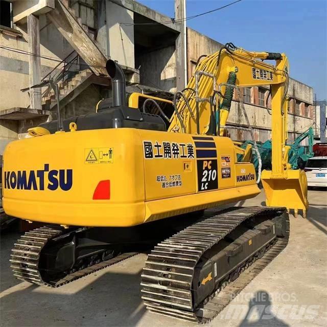 Komatsu PC 210 Pásová rýpadla