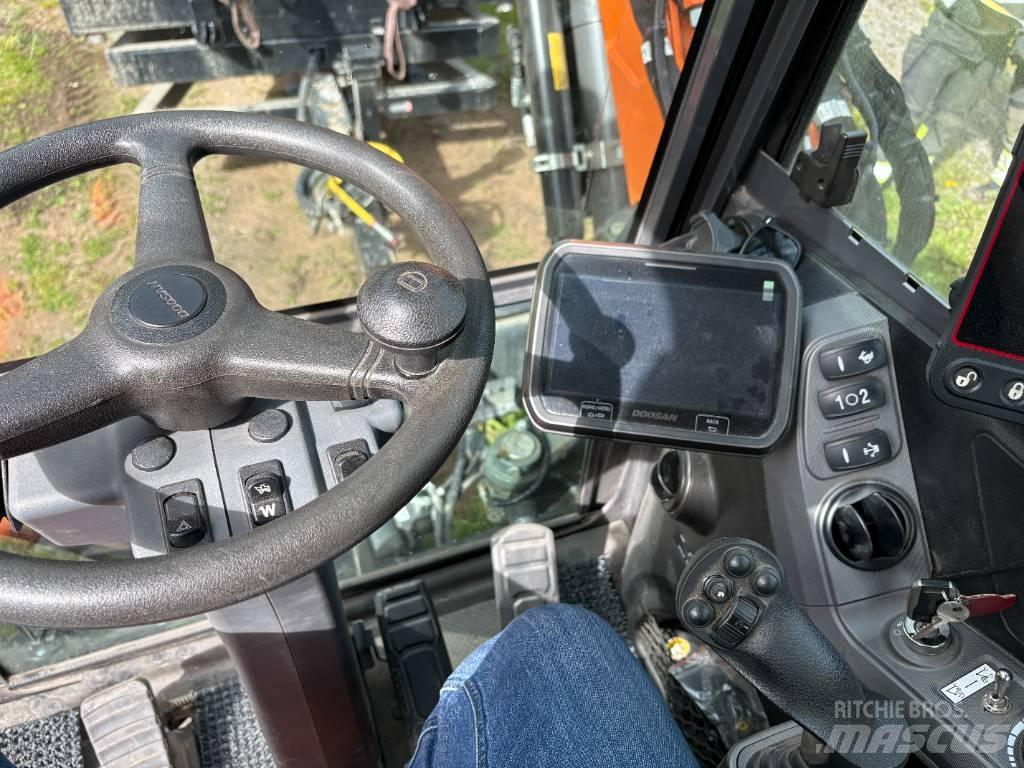 Develon DX 100 W-7 Kolová rýpadla