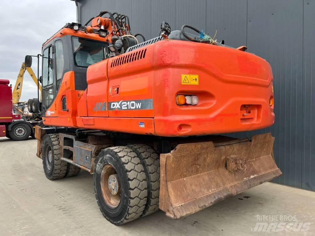 Doosan DX210W Kolová rýpadla