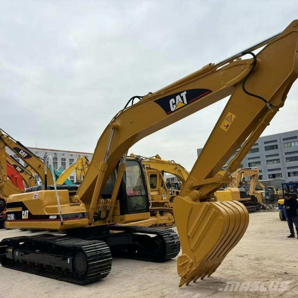 CAT 320BL Pásová rýpadla