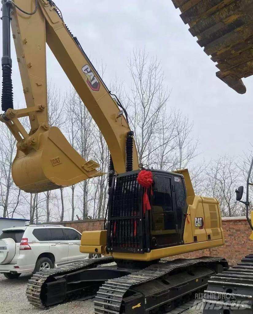 CAT 323 Pásová rýpadla