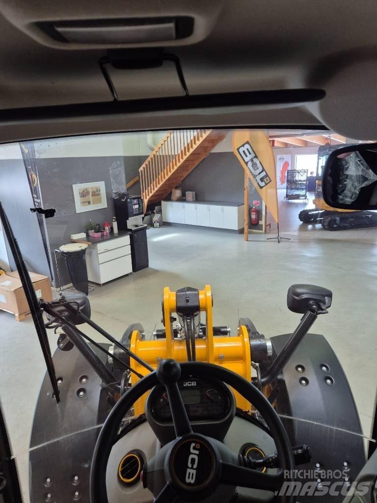 JCB 409 Kolové nakladače