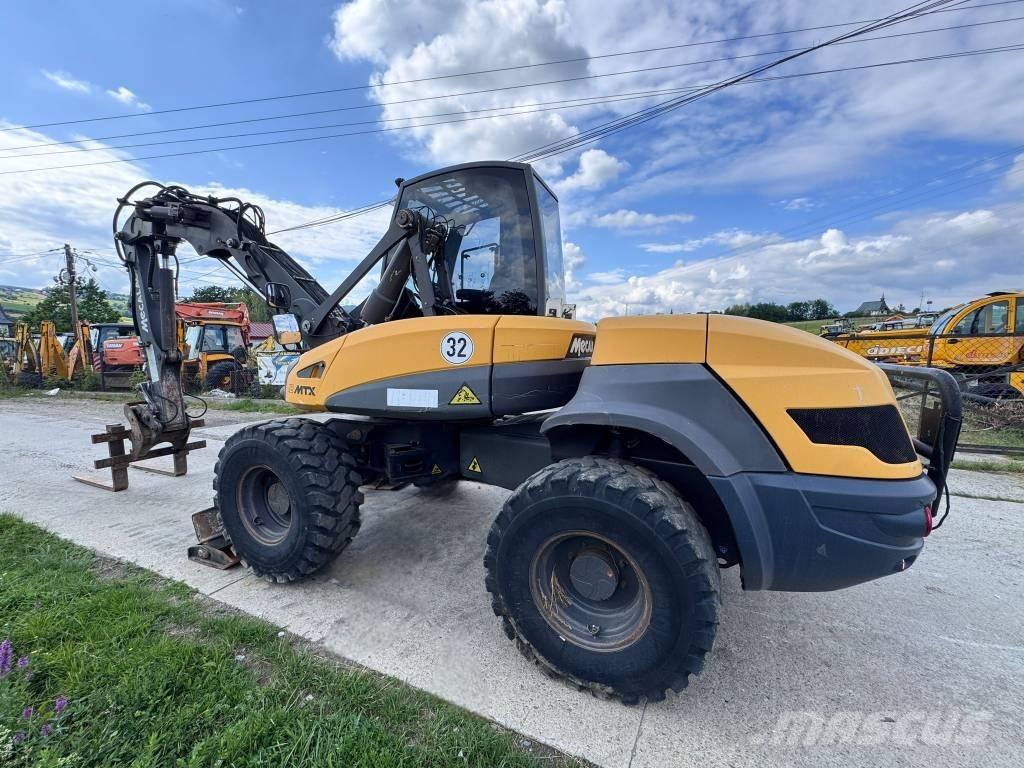 Mecalac 12 MTX Rýpadlo-nakladače