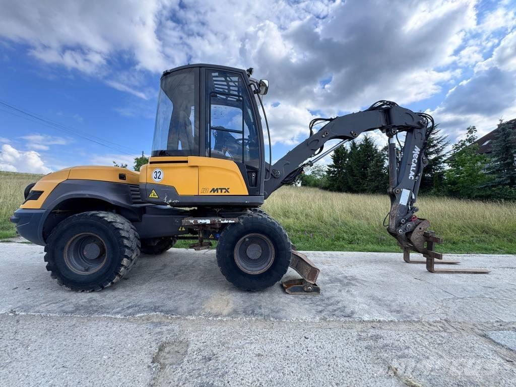 Mecalac 12 MTX Rýpadlo-nakladače