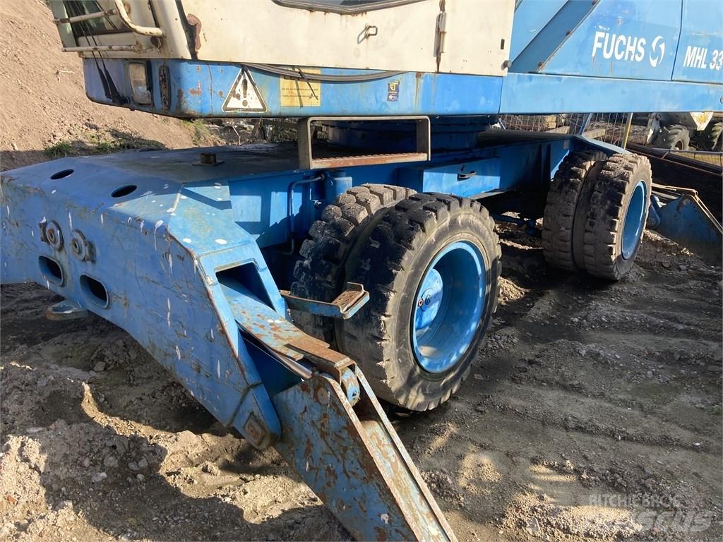 Fuchs MHL 331 Stroje pro manipulaci s odpadem