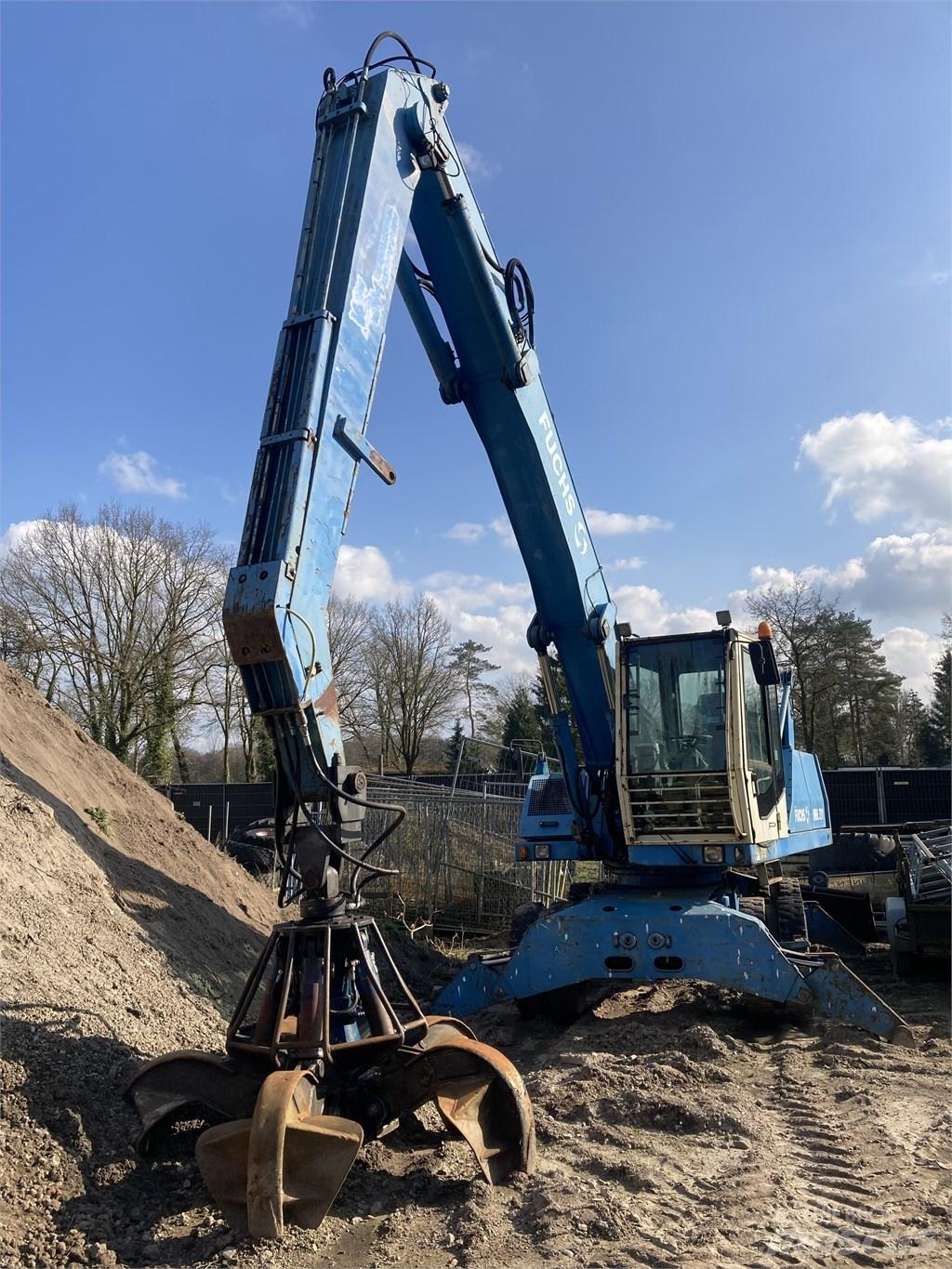 Fuchs MHL 331 Stroje pro manipulaci s odpadem