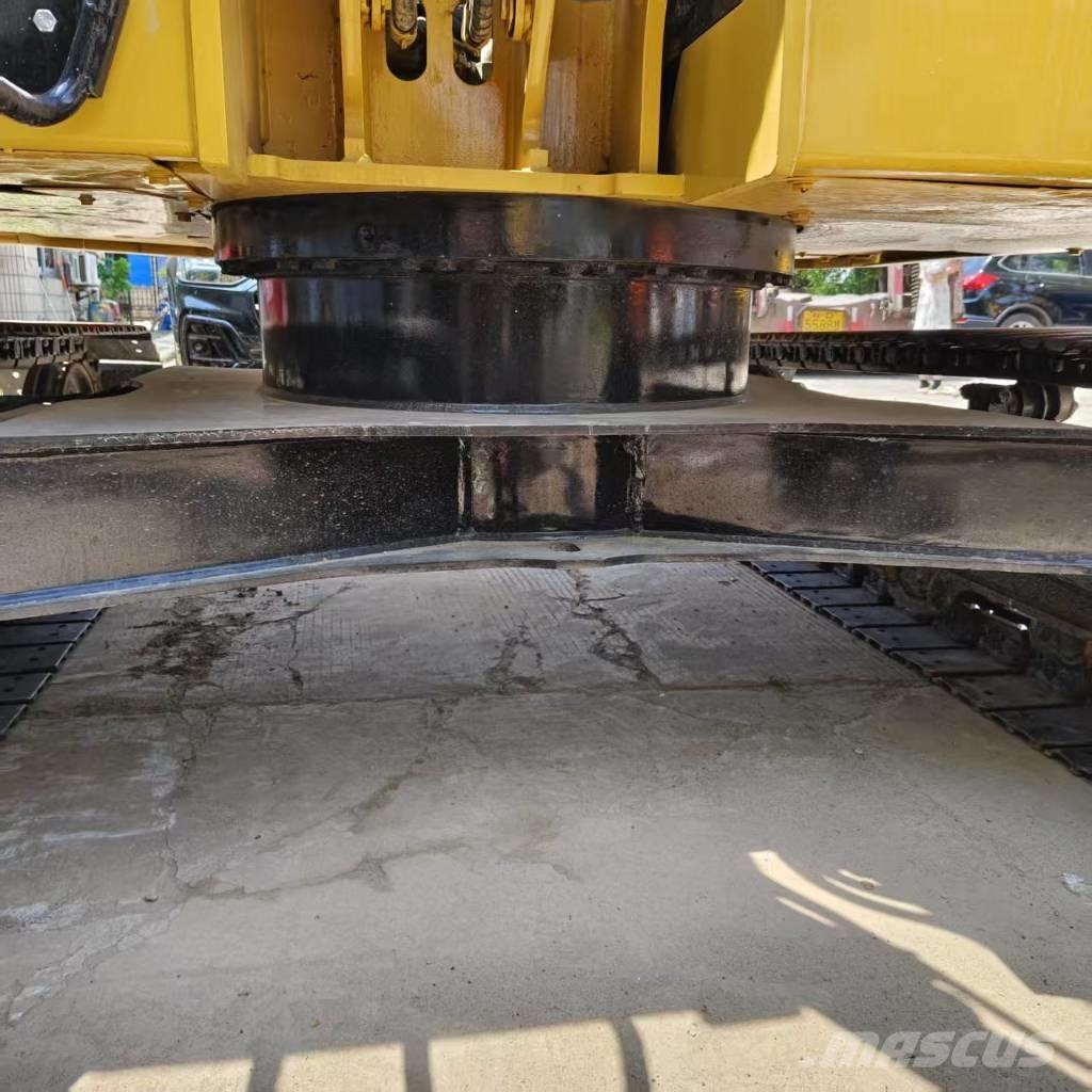 CAT 310 Pásová rýpadla