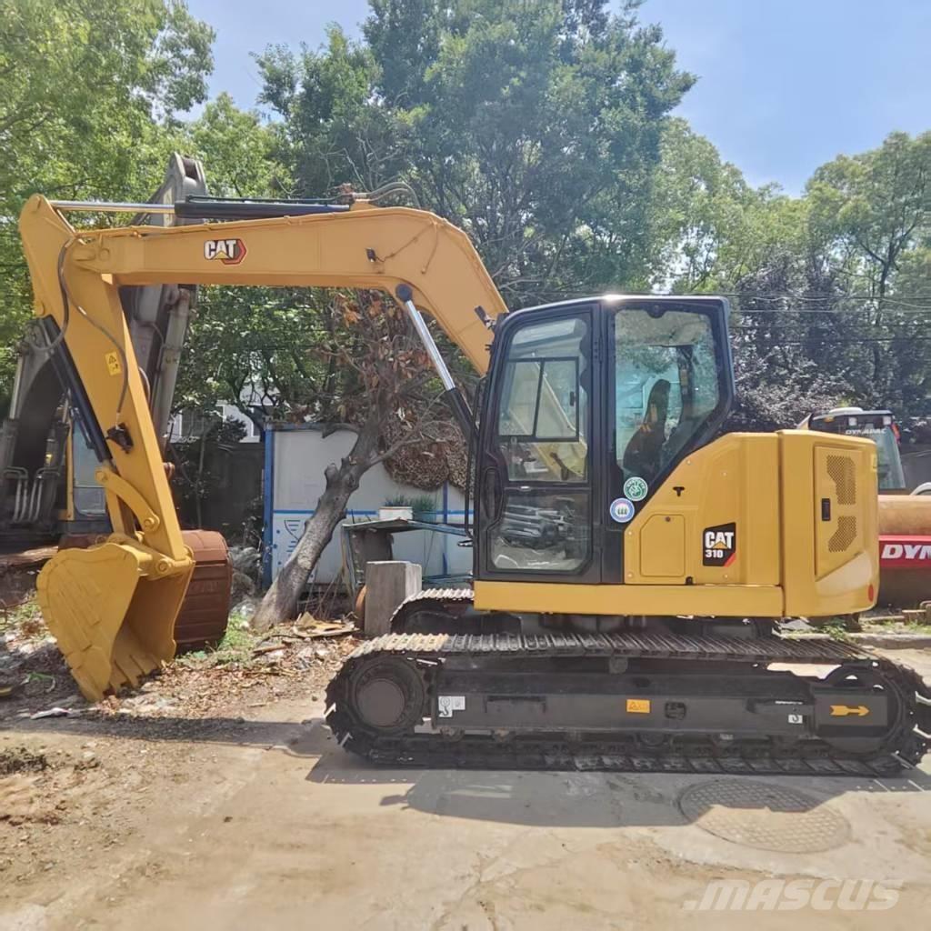 CAT 310 Pásová rýpadla