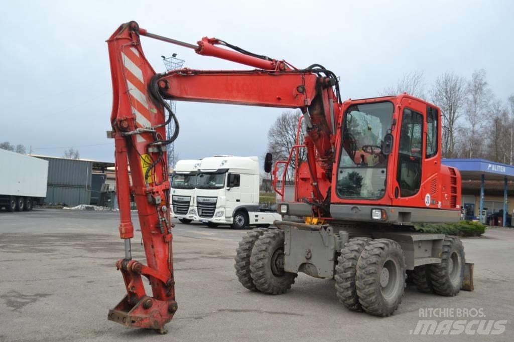 Komatsu PW 148-8 Kolová rýpadla