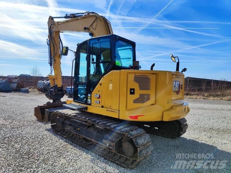 CAT 310-07A Pásová rýpadla