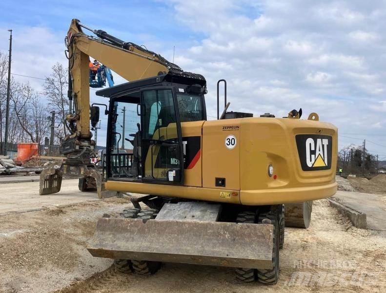 CAT M316F Kolová rýpadla