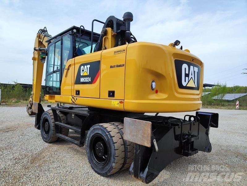 CAT MH3024 Stroje pro manipulaci s odpadem