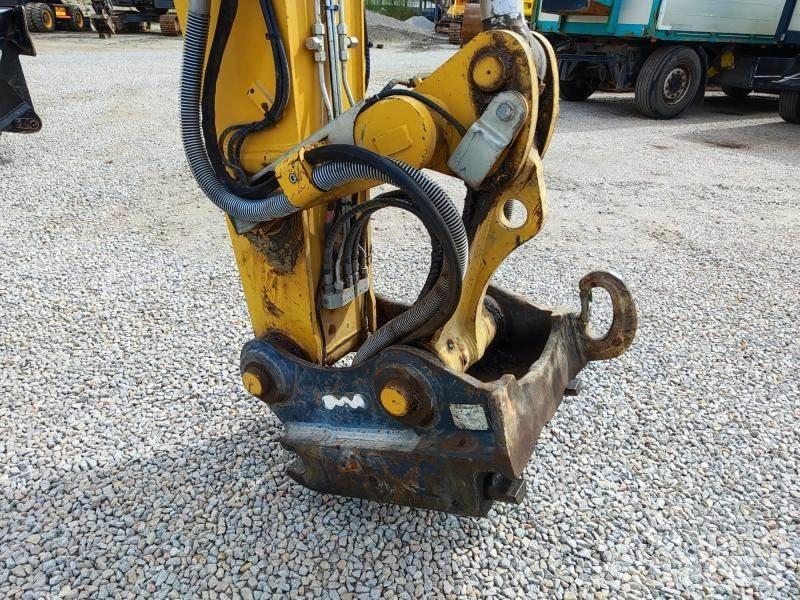 CAT MH3024 Stroje pro manipulaci s odpadem
