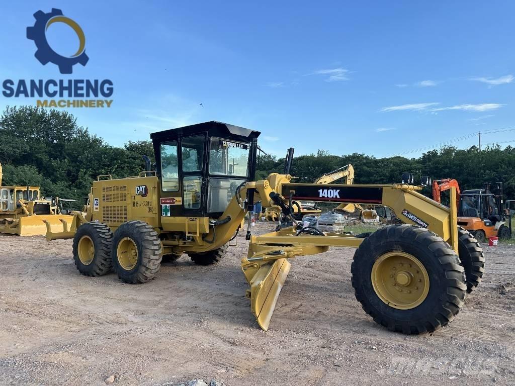CAT 140K Grejdry