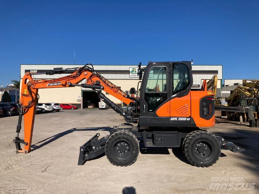 Develon DX 100 W-7 Kolová rýpadla