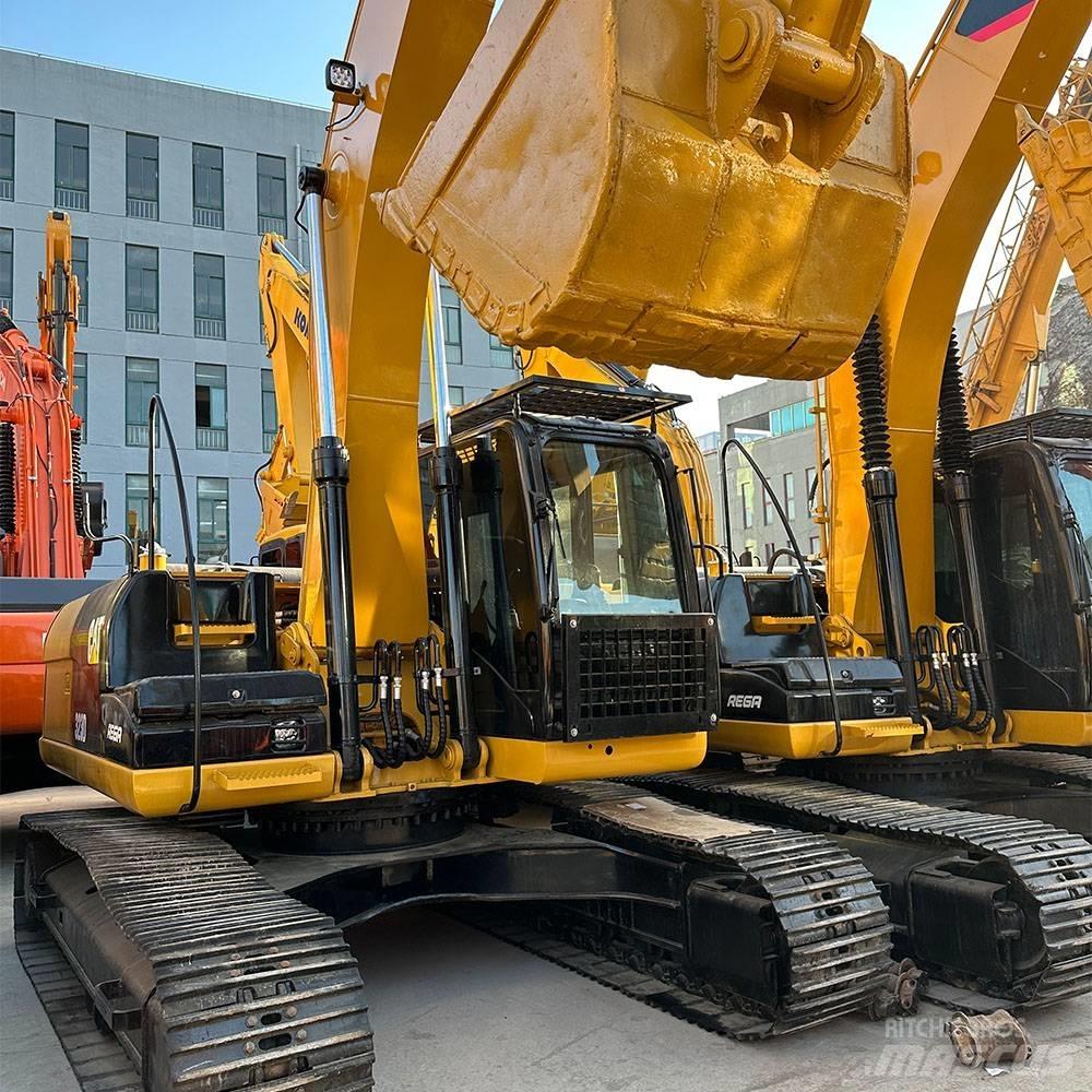 CAT 323 D Pásová rýpadla