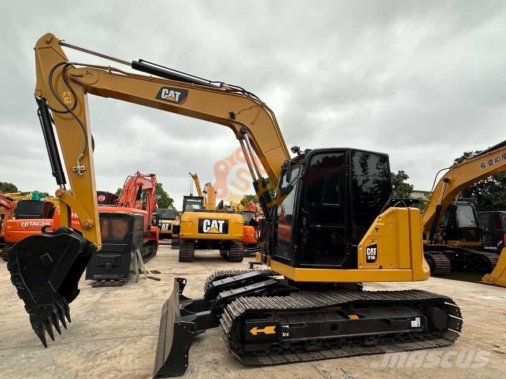 CAT 310 Pásová rýpadla