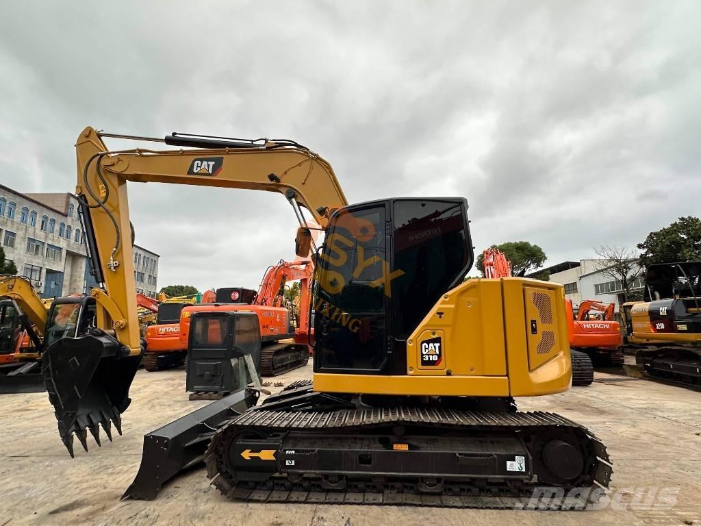 CAT 310 Pásová rýpadla