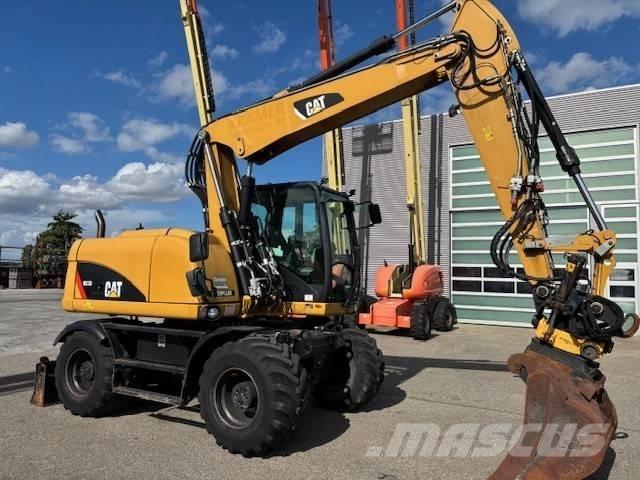 CAT M 313 D Kolová rýpadla