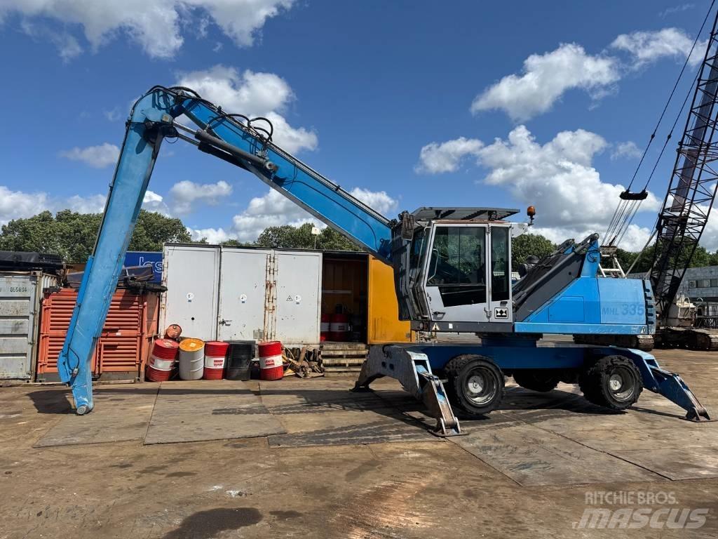 Fuchs MHL 335 Stroje pro manipulaci s odpadem