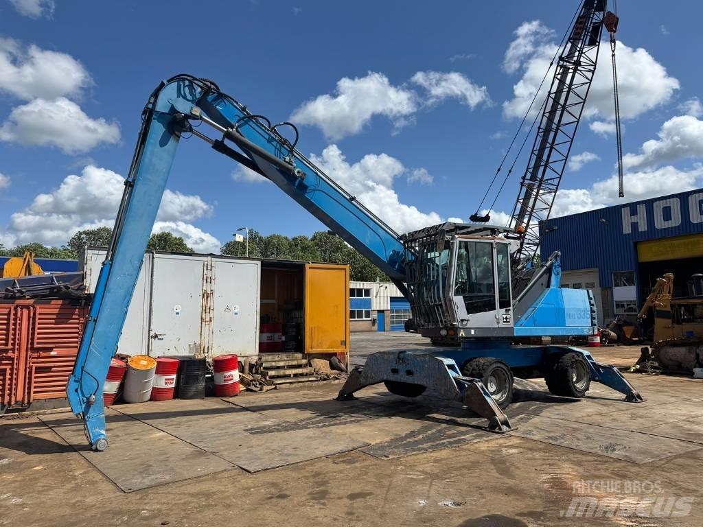 Fuchs MHL 335 Stroje pro manipulaci s odpadem