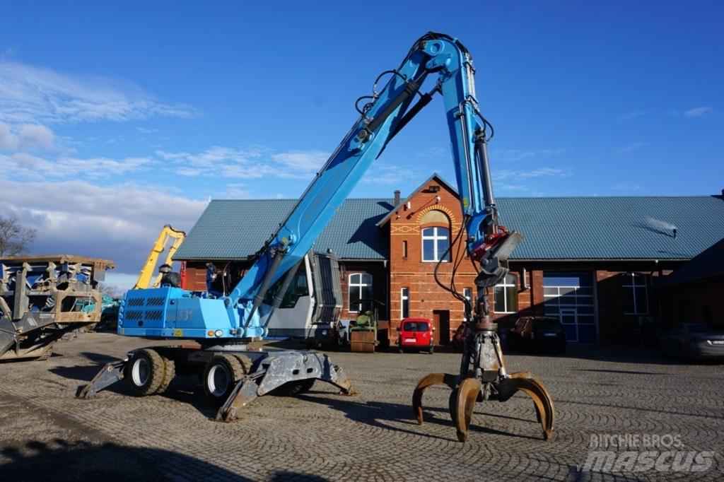 Fuchs MHL 331 Stroje pro manipulaci s odpadem