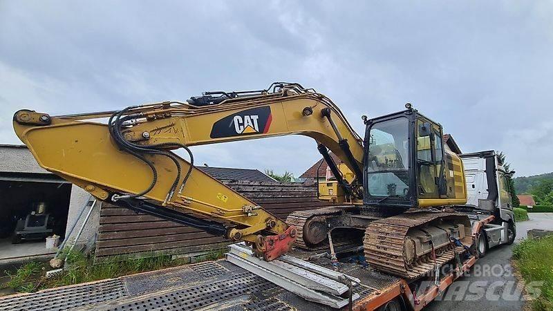 CAT 318 FL Pásová rýpadla