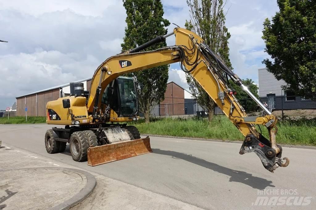 CAT M313 D Kolová rýpadla