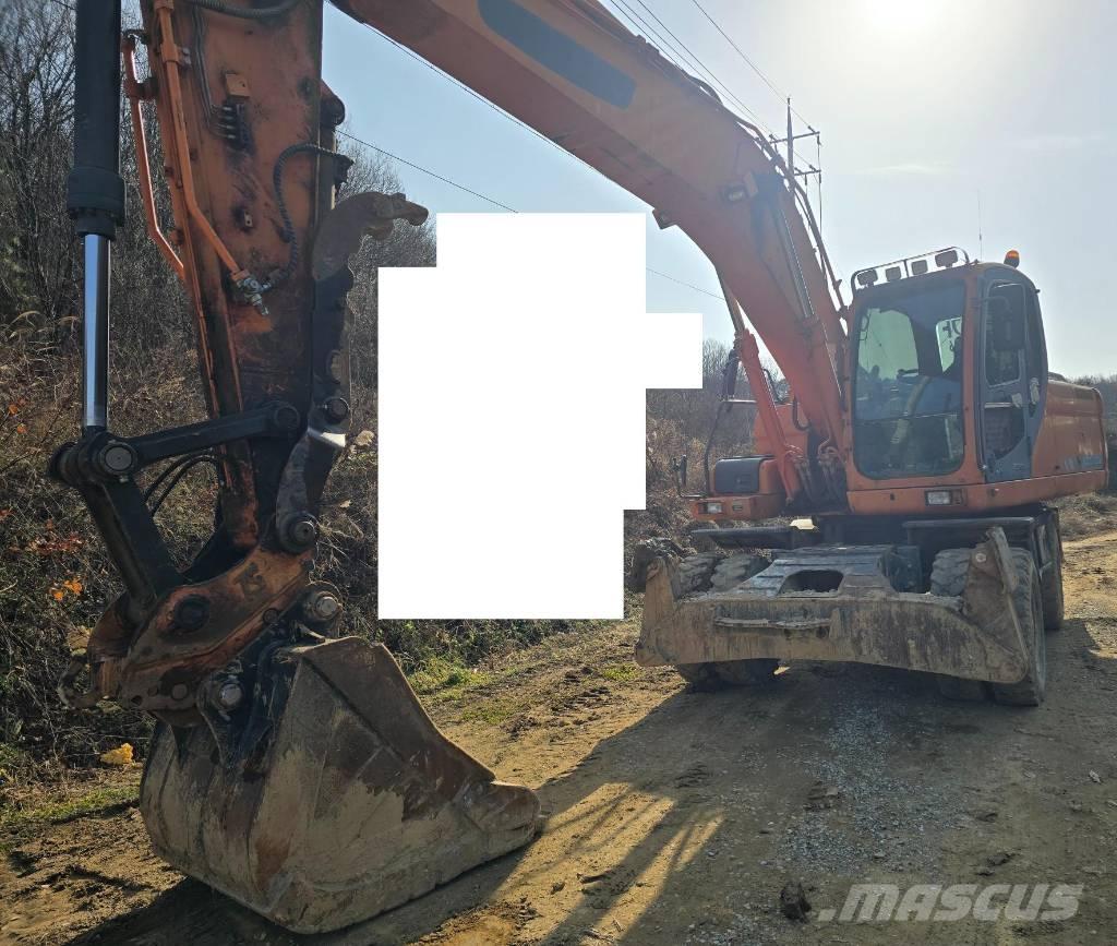 Doosan DX 210 W Kolová rýpadla