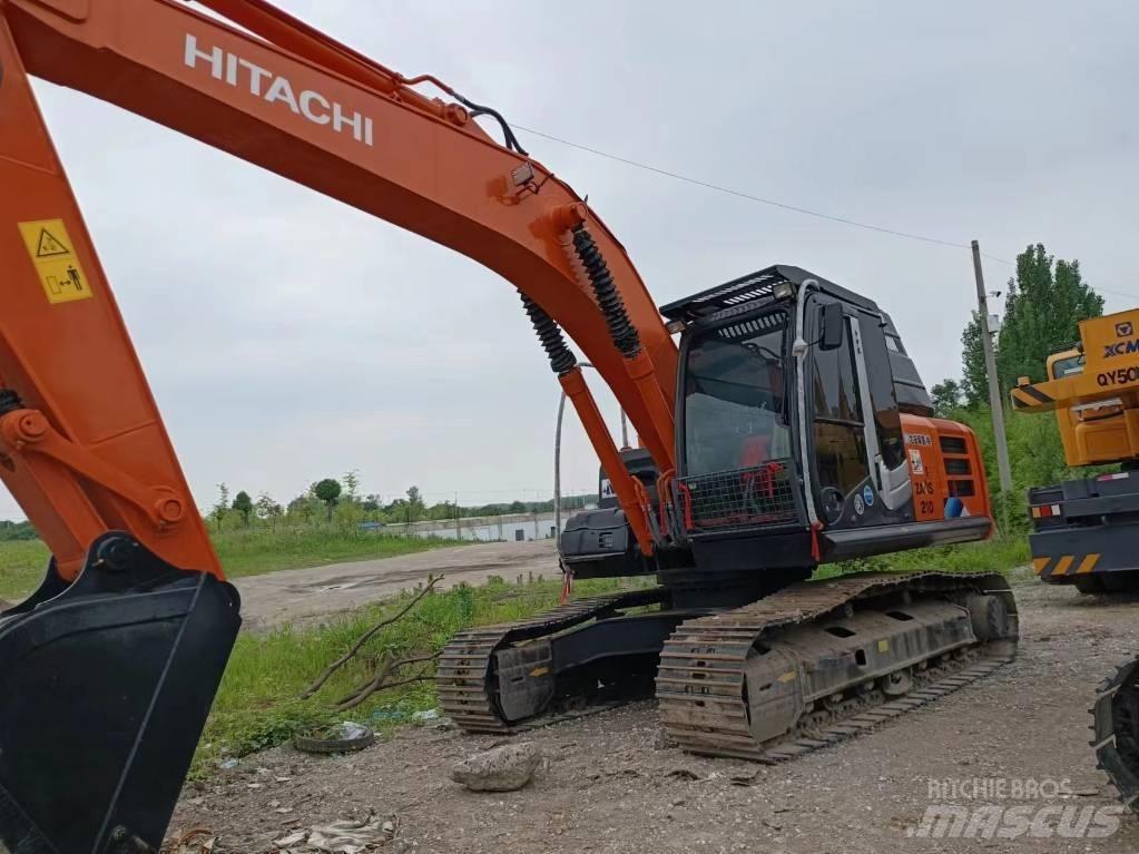 Hitachi ZX210 Pásová rýpadla