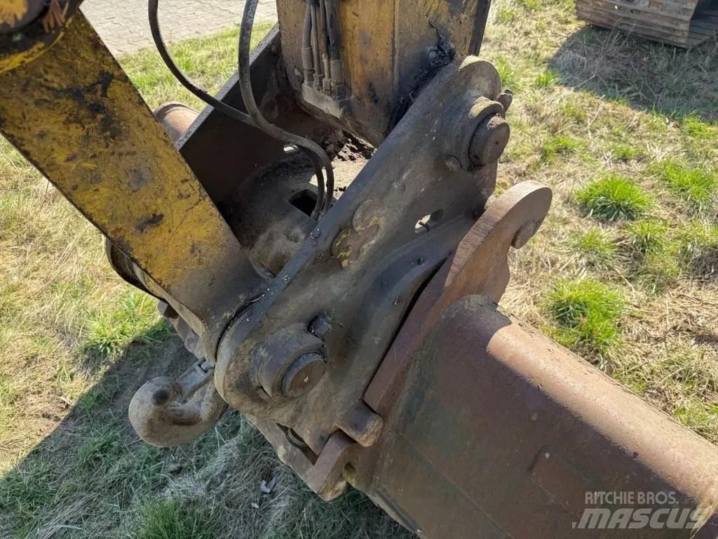 New Holland E215 Pásová rýpadla