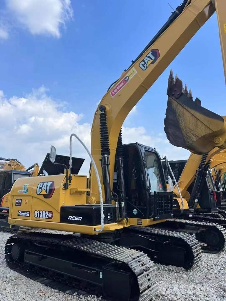 CAT 313 Pásová rýpadla