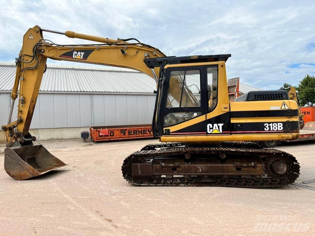 CAT 318BL Pásová rýpadla