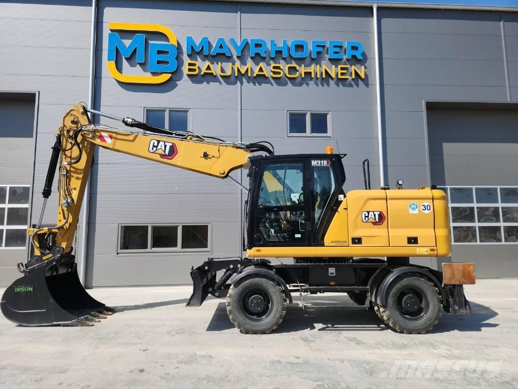 CAT M 318 Kolová rýpadla