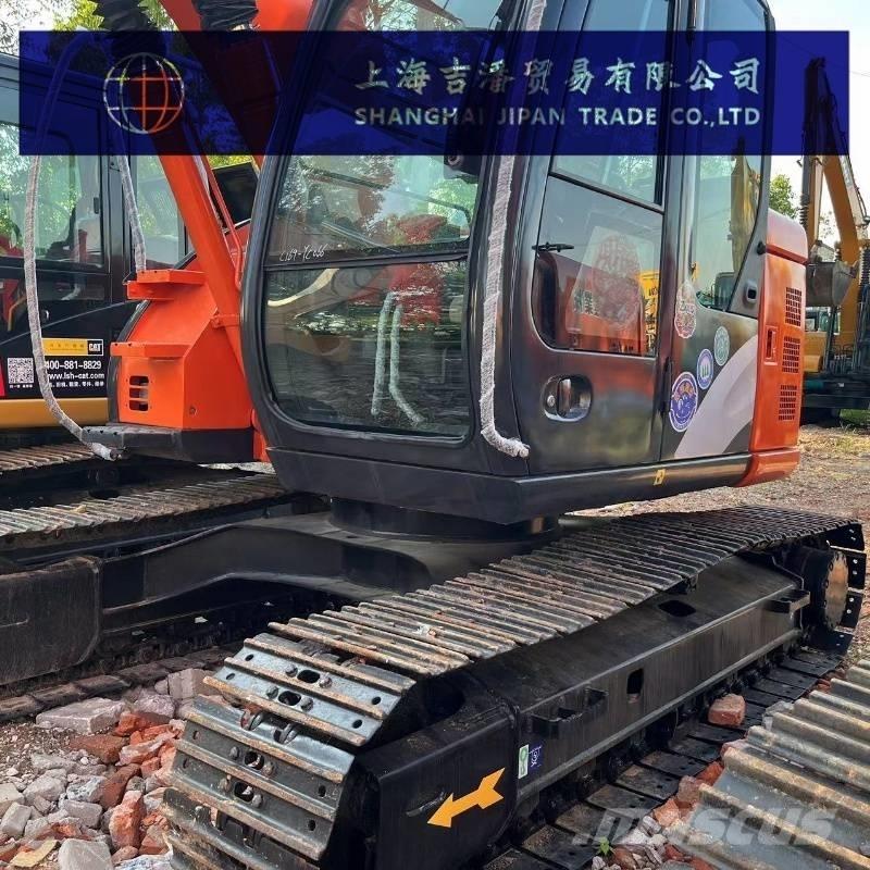 Hitachi ZX 135 Pásová rýpadla