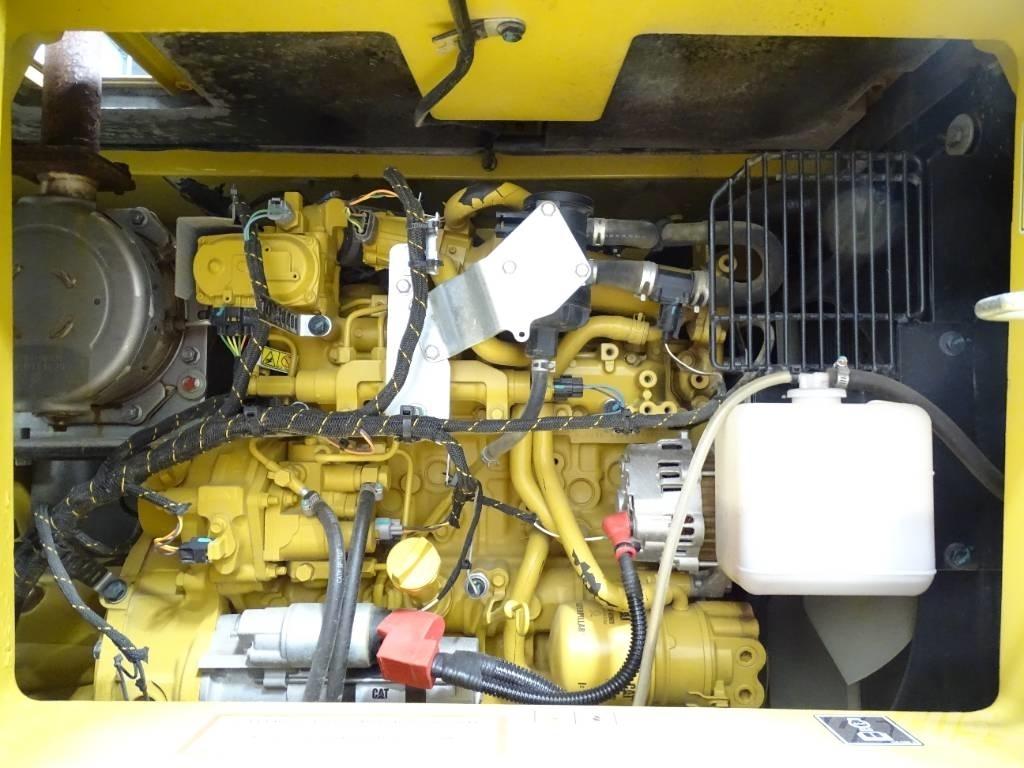 CAT 310 Pásová rýpadla