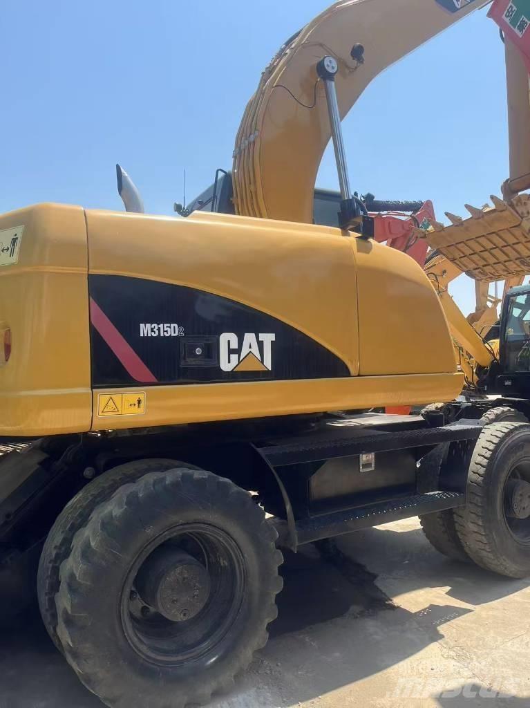 CAT 315 D Kolová rýpadla