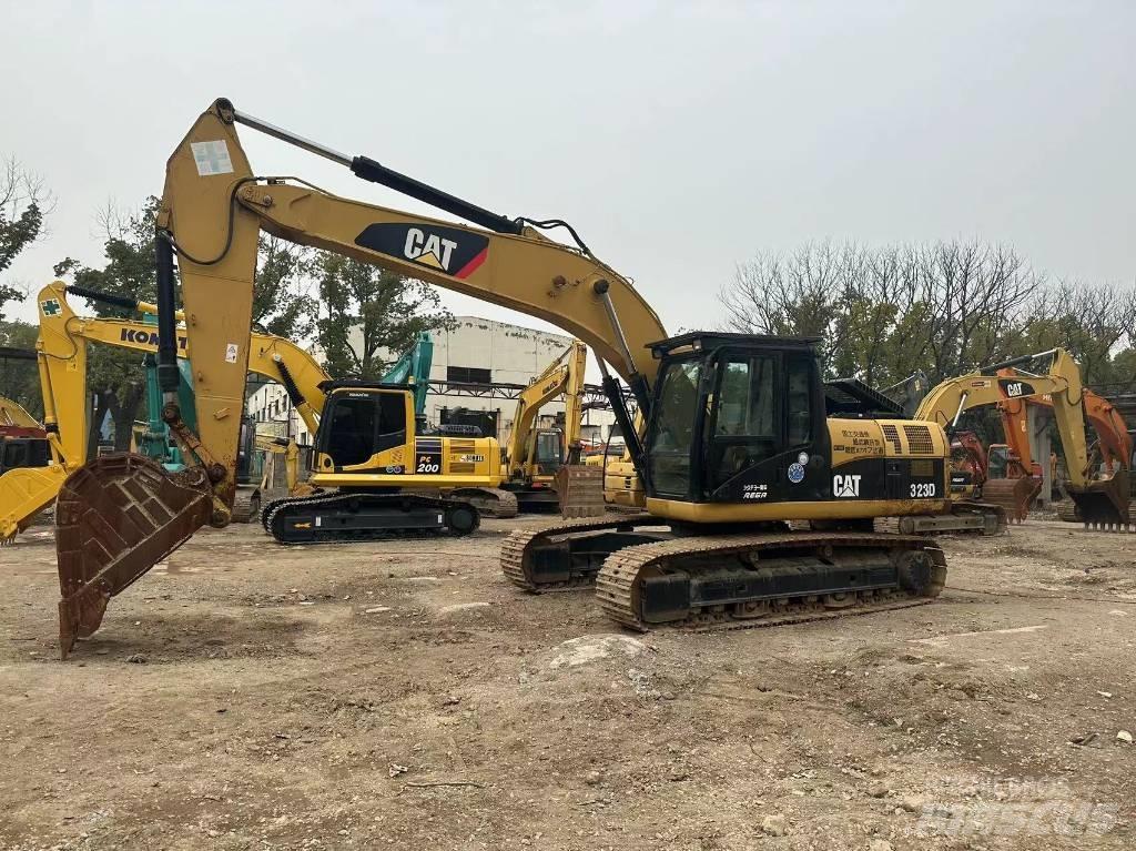 CAT 323D Pásová rýpadla