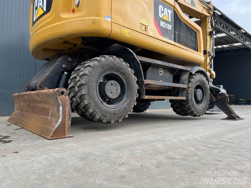 CAT M318F Kolová rýpadla