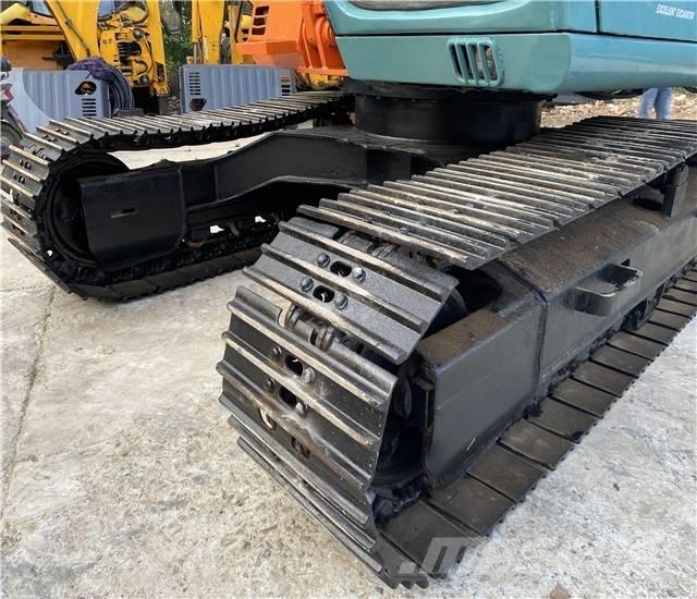 Hitachi EX120 Pásová rýpadla