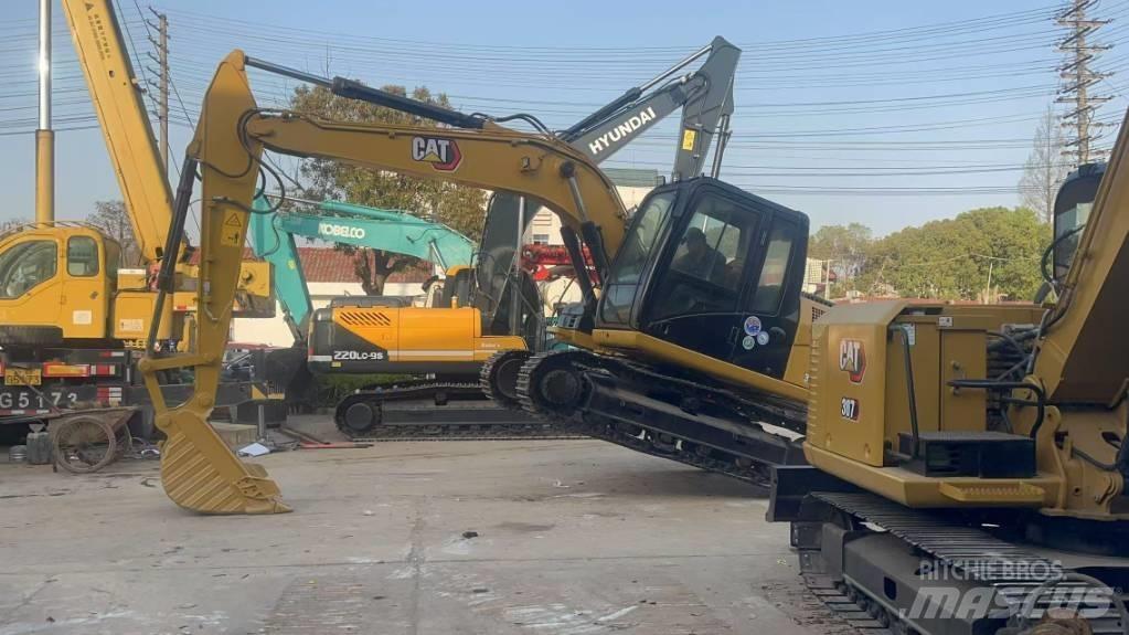 CAT 313 D Pásová rýpadla
