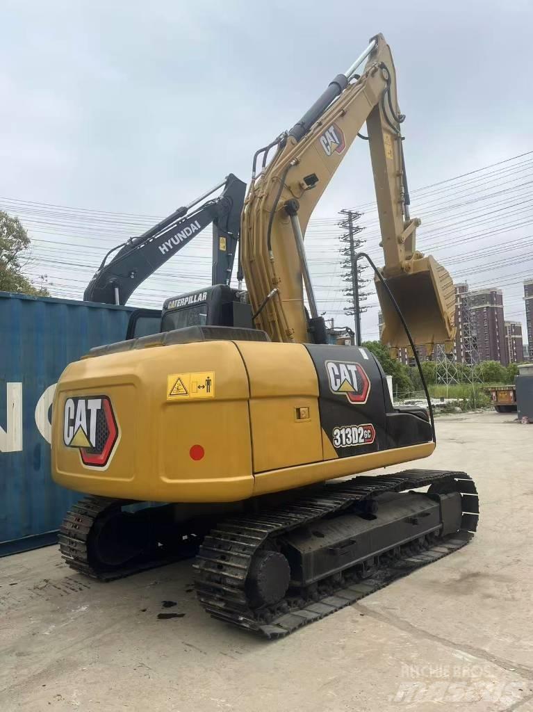 CAT 313 D Pásová rýpadla