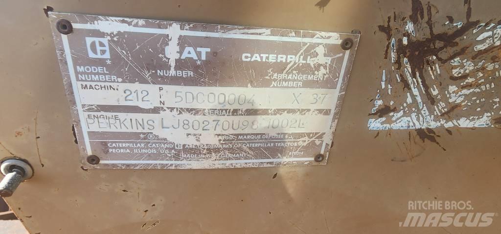 CAT 212 Kolová rýpadla