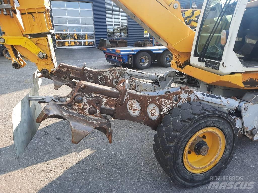 Menzi Muck M525 Kolová rýpadla