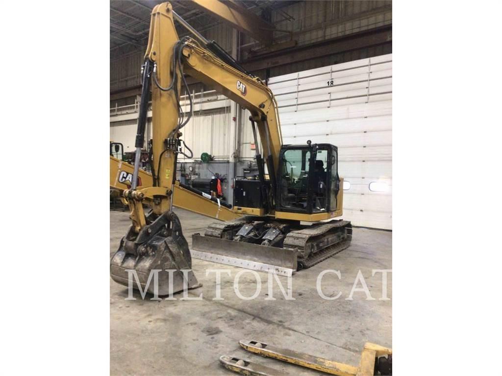 CAT 310 Pásová rýpadla