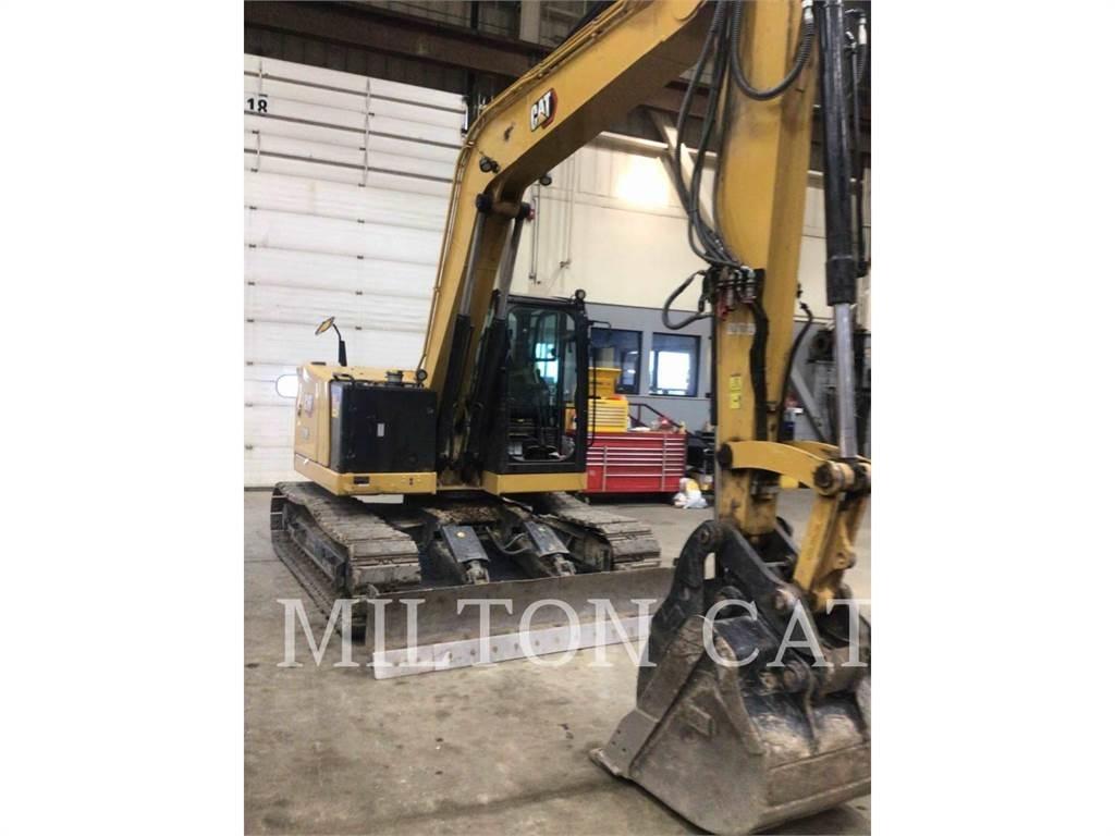 CAT 310 Pásová rýpadla