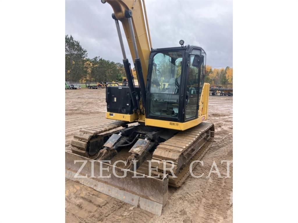 CAT 310 Pásová rýpadla