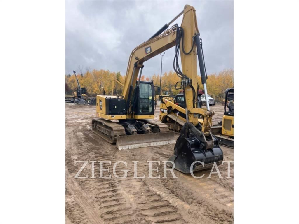 CAT 310 Pásová rýpadla